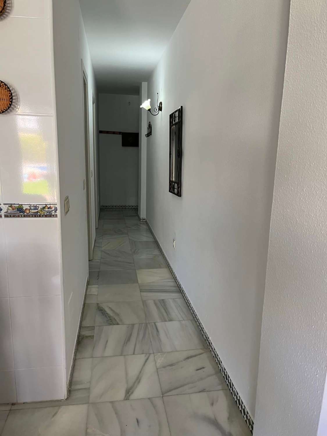 APARTAMENTO EN PLANTA BAJA CON PISCINA COMUNITARIA