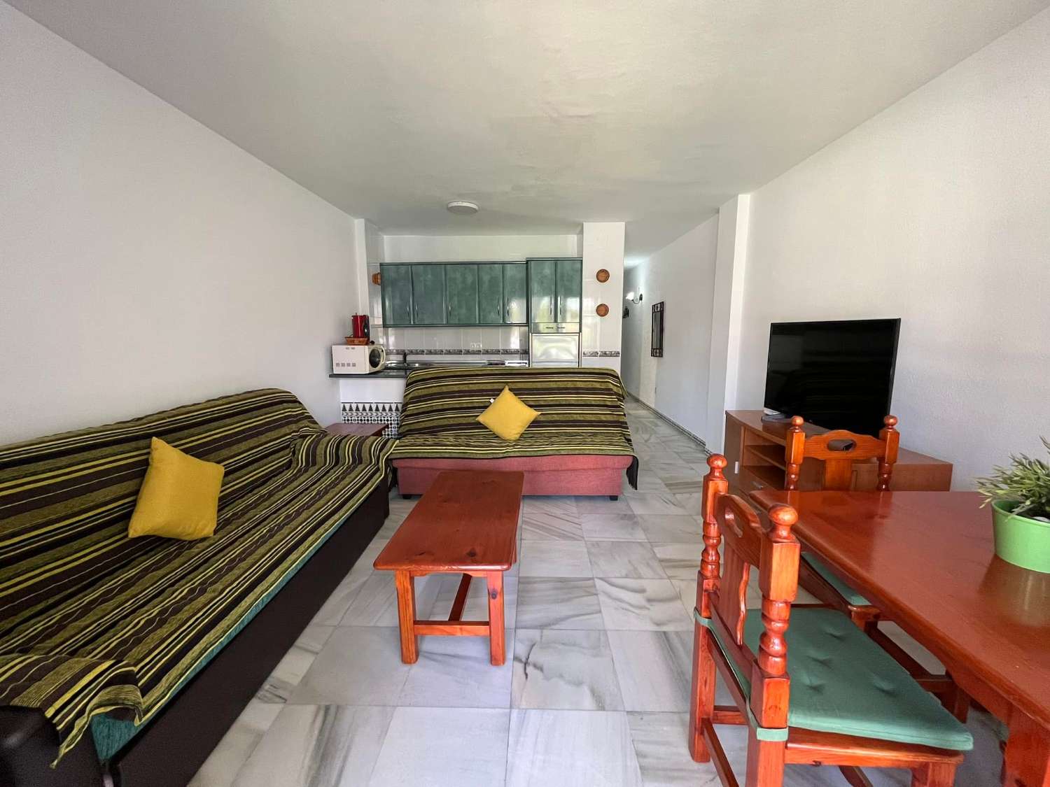 APARTAMENTO EN PLANTA BAJA CON PISCINA COMUNITARIA