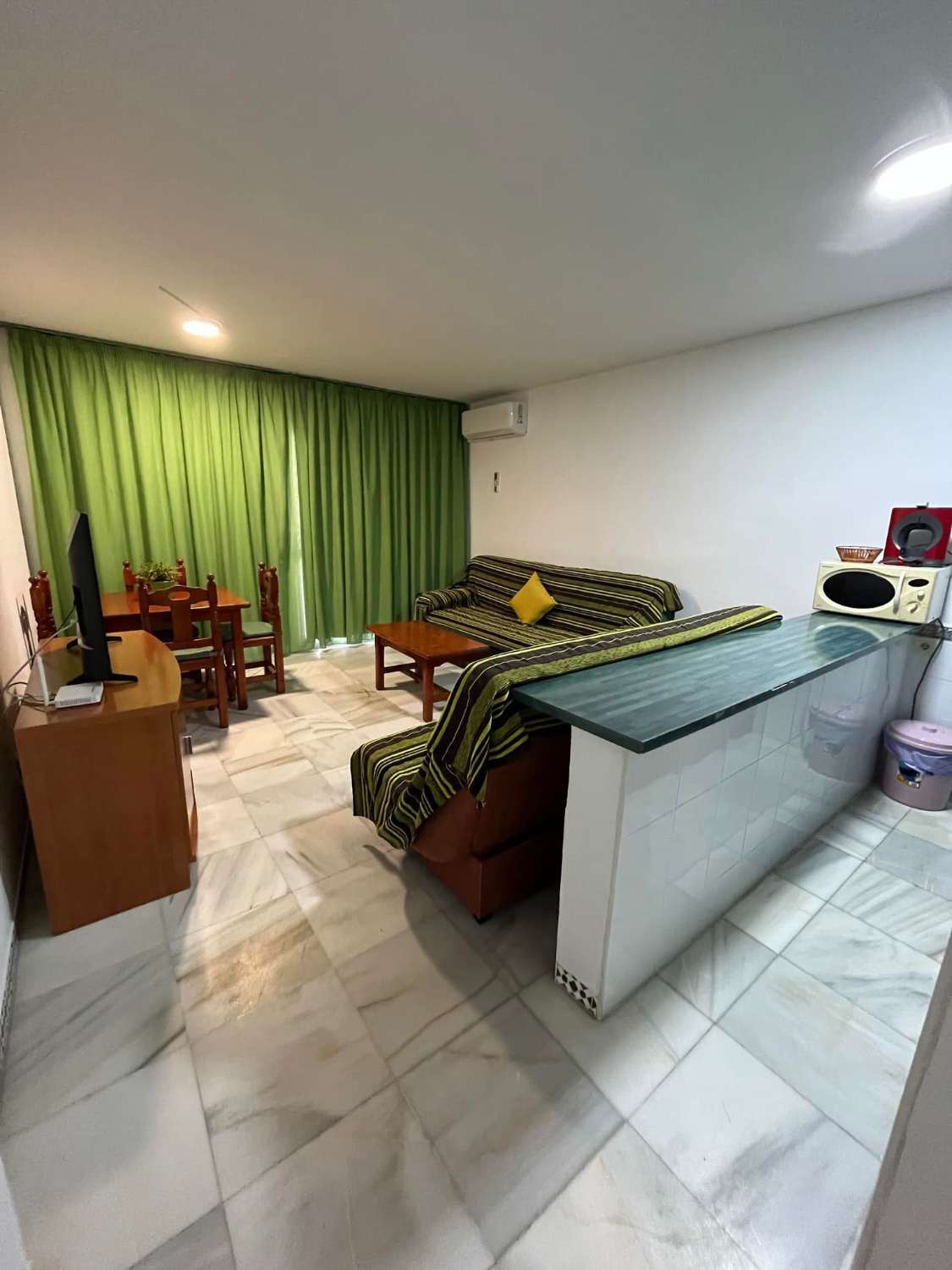 APARTAMENTO EN PLANTA BAJA CON PISCINA COMUNITARIA