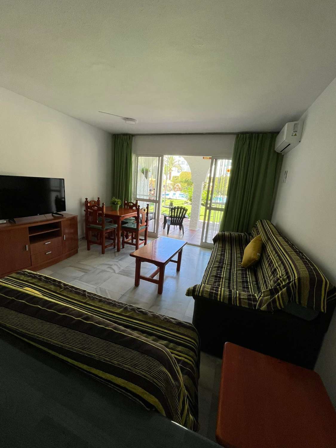 APARTAMENTO EN PLANTA BAJA CON PISCINA COMUNITARIA