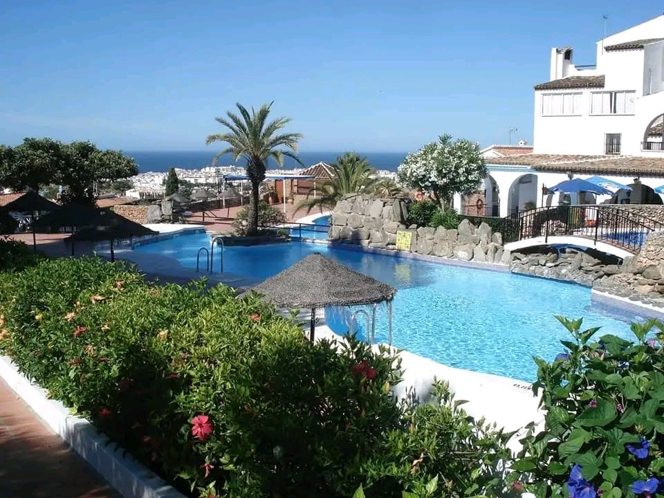 APARTAMENTO DOS DORMITORIOS CON PISCINA COMUNITARIA